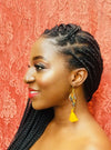 Riri map of Africa tassel earrings. Orange